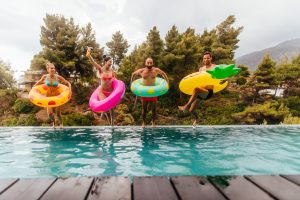Friends Are Jumping Into The Pool